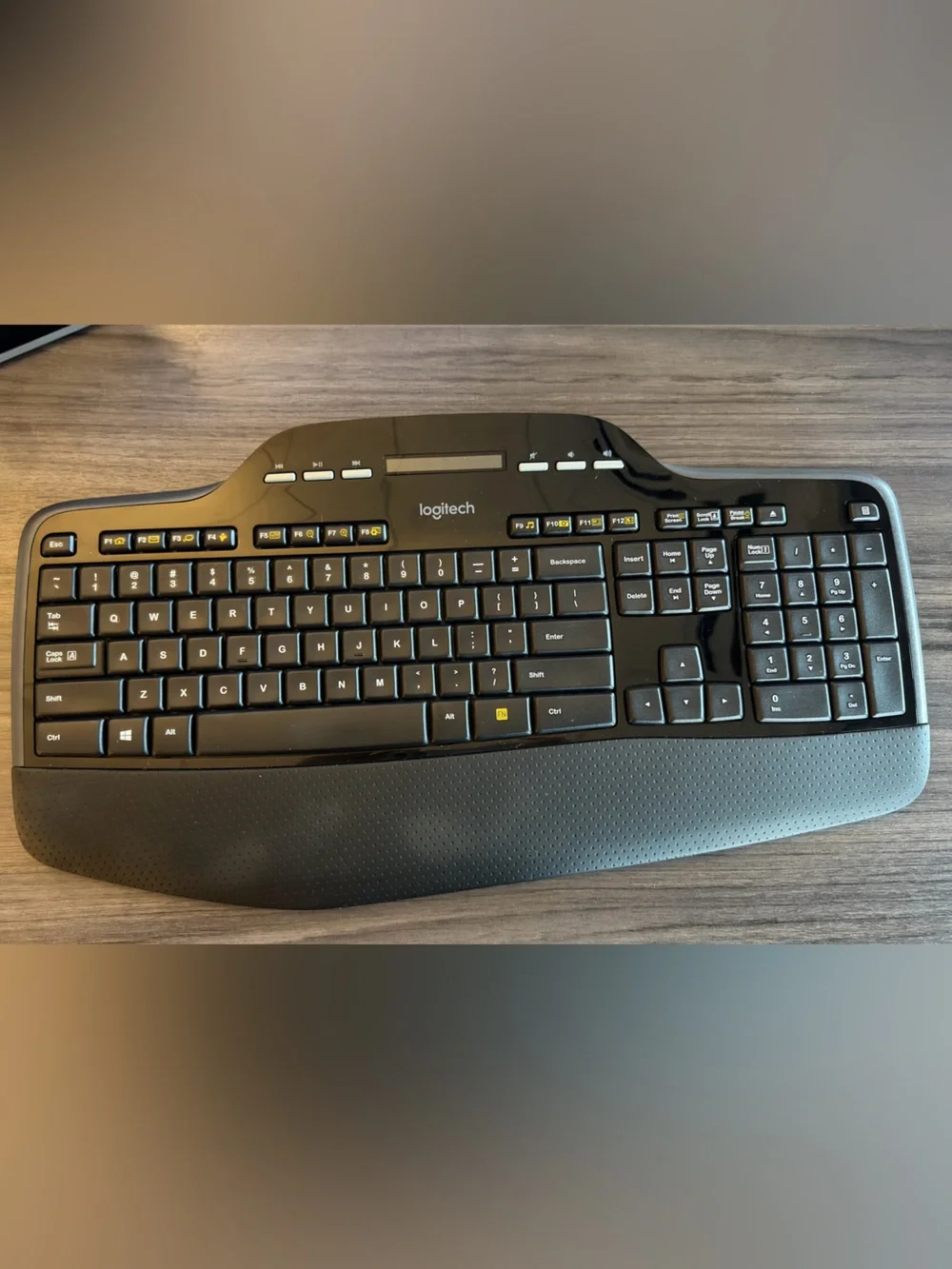 Logitech black wireless ergonomic keyboard with palm rest